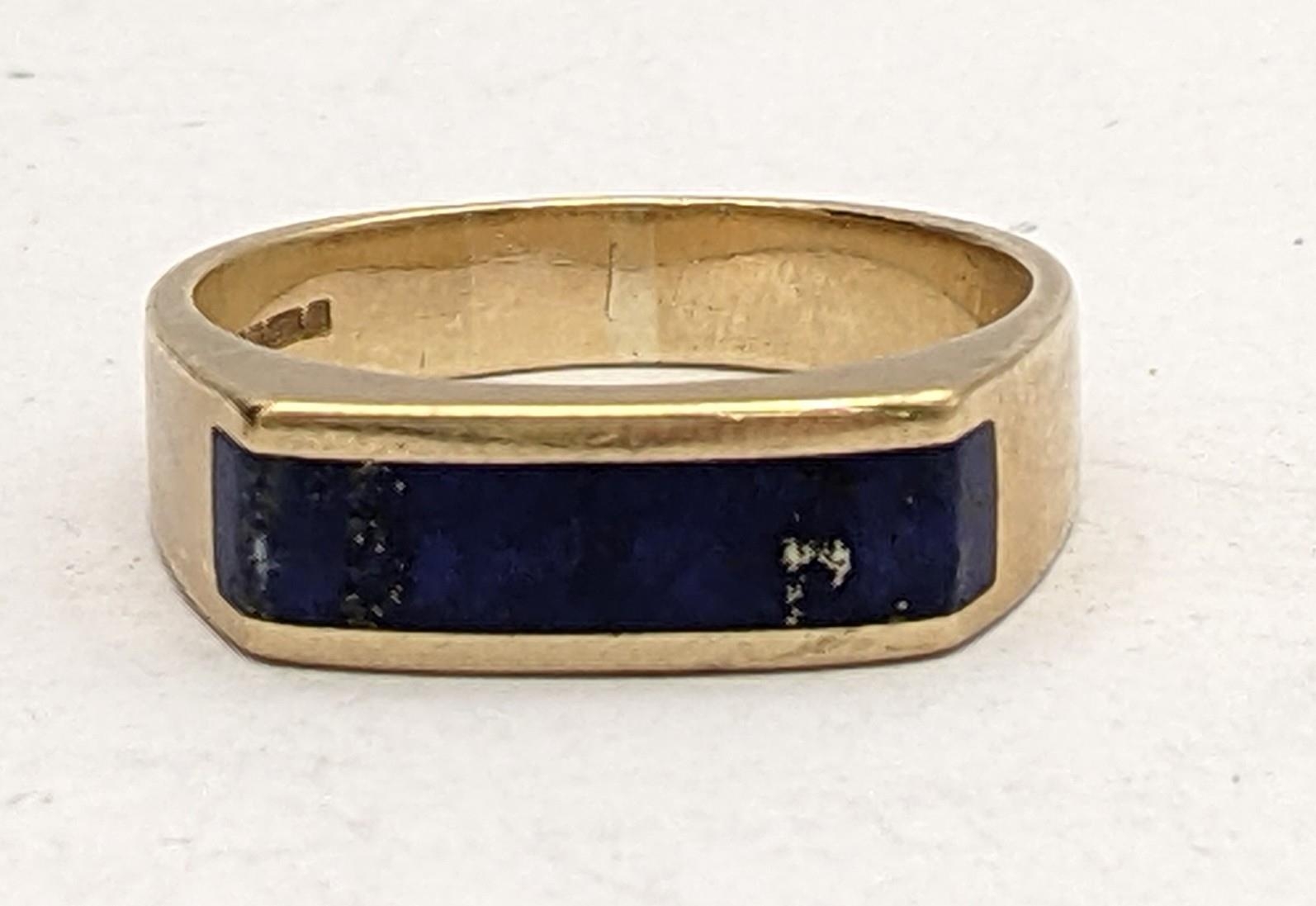A 9ct gold and blue enamel gents ring 6.8g Location: