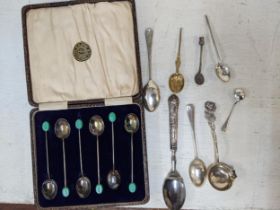 Silver spoons to include a set of six coffee bean terminal teaspoons, a pouring spoon, a 97g