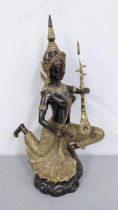 A patinated bonze Thai deity figure playing an instrument, 40h, Location: