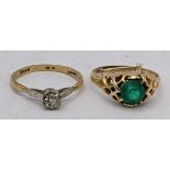 A 9ct gold diamond illusion set ring 2.2g together with a yellow metal ring inset with a green stone