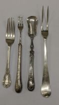 Mixed silver to include an Irish silver meat fork and a Victorian table fork 78.6g together with a