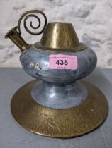 A 19th century Islamic brass and pewter hookah pot, wine flask and powder flask Location: 9.1