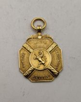 A 9ct gold Scottish bowling/ London association pendant total weight 12.1g Location: