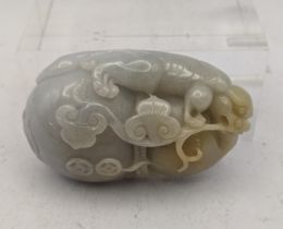 Carved jade in the form of a Chinese dragon, 7cm h x 4cm w Location: