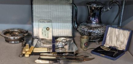 A mixed lot of silver plate and metalware items to include a silver plated teapot, wine coaster,