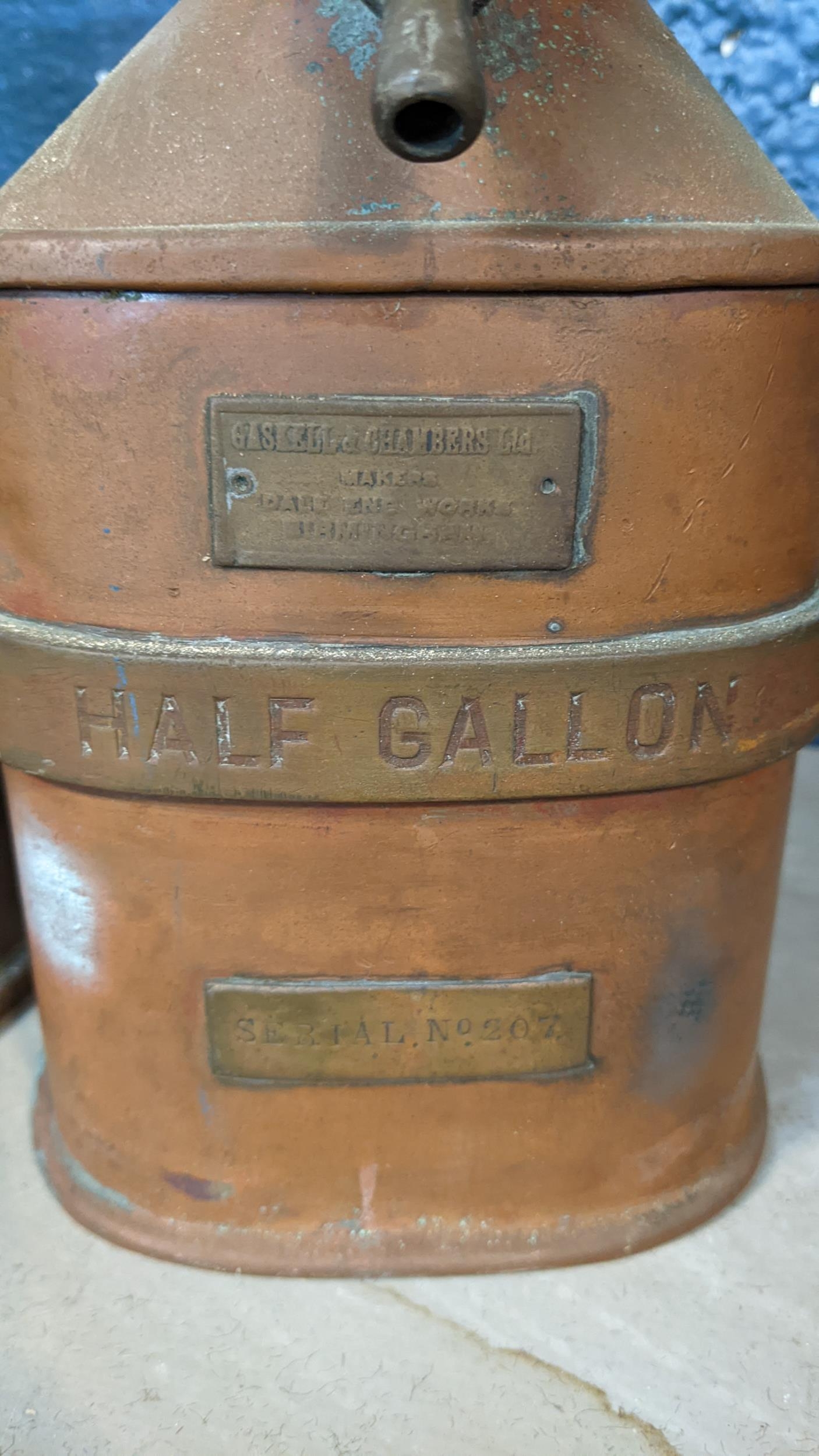 An early 20th century Gaskell & Chambers half gallon petrol measure and a copper gallon jug, - Image 2 of 2