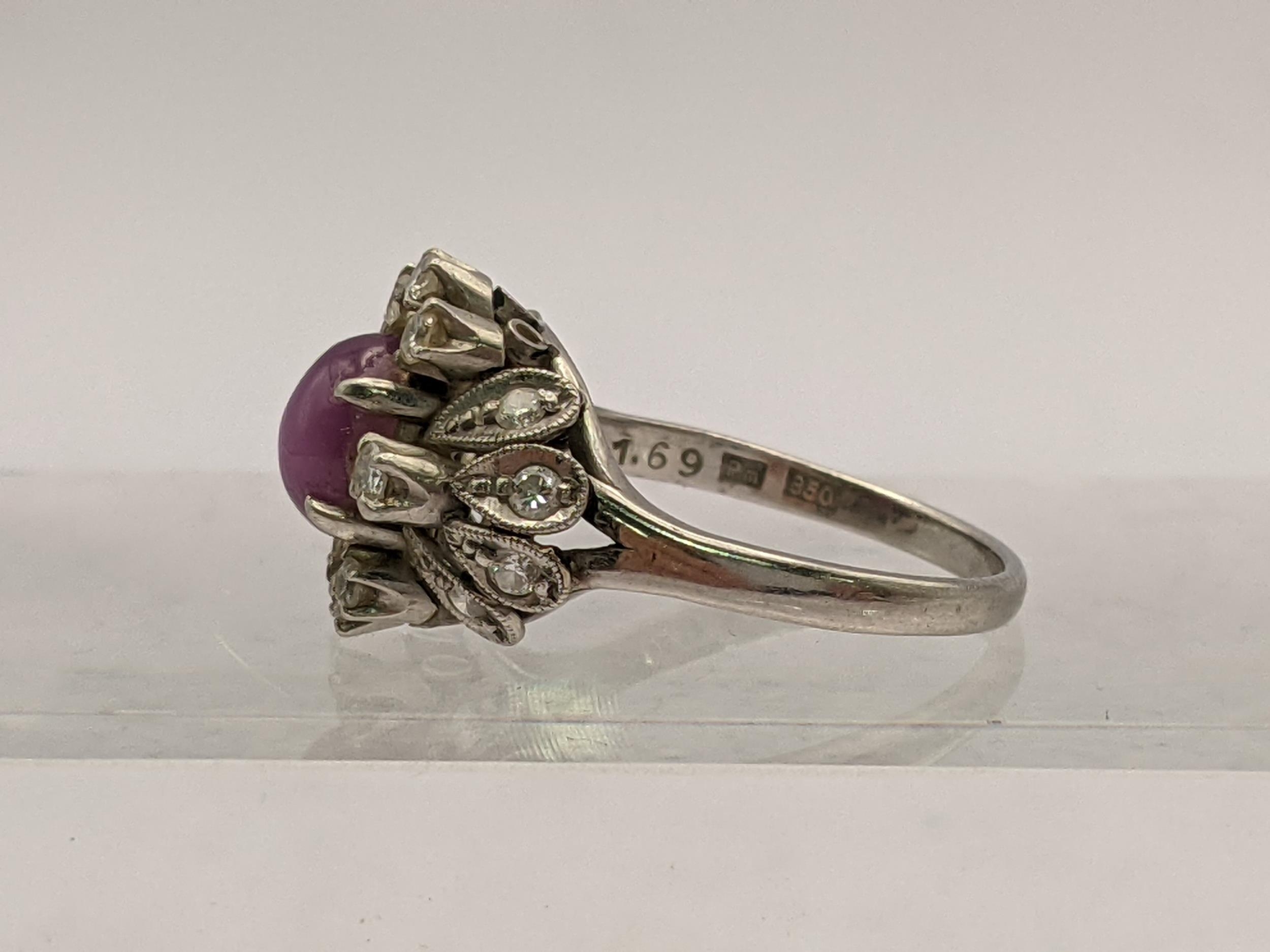 A platinum ring stamped 850 set with a central purple stone and diamonds, total weight 4.4g - Image 4 of 4