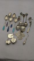 Mixed silver to include five coffee spoons, collectors spoons, a silver thimble, a miniature