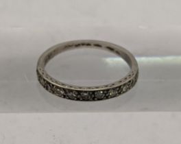 A white metal, tested as 14ct gold half eternity ring, set with diamonds, total weight 3.7g