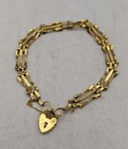 A 9ct gold gate linked bracelet having a heart shaped clasp, total weight 4.8g, Location: