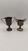 Two miniature trophy cups, one hallmarked Birmingham 1929, the other stamped Sterling, total