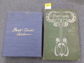 Two postcard albums to include an Art Nouveau example containing mainly tourist postcards circa 1910