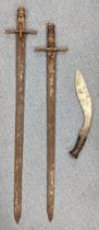 A pair of Medieval style cross guard swords, along with a Kukri without scabbards, Location: