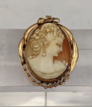 A 14ct gold cameo brooch on a later safety chain