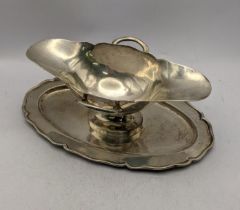 A white metal sauceboat on stand stamped 900, total weight 533g Location: