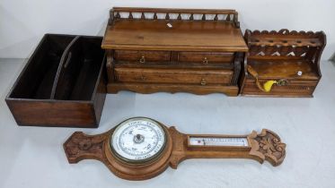 Mixed treen items to include an early 20th century aneroid barometer, cigar stand and other items,