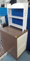 A 2 drawer filing chest together with a small white table top shelf unit. Location:SR