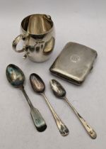 Silver comprising of a cream jug, three teaspoons, a late 20th century tea caddy spoon and a