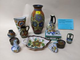 A group of early to mid 20th century Dutch Gouda and Royal Goedewaagen ceramics to include coasters,