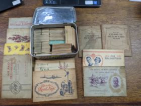 A collection of mixed cigarette, tea and other cards, along with Wills albums Location: