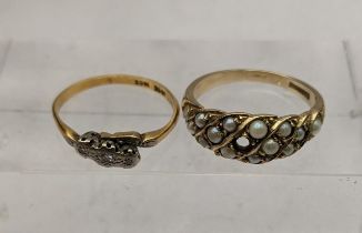 A 18ct gold and platinum ring set with three diamonds 2.1g together with a 9ct gold cluster ring set