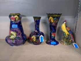 Four pieces of S Hancock & Sons Rubens Ware to include an exotic bird perched on a stump, a vase