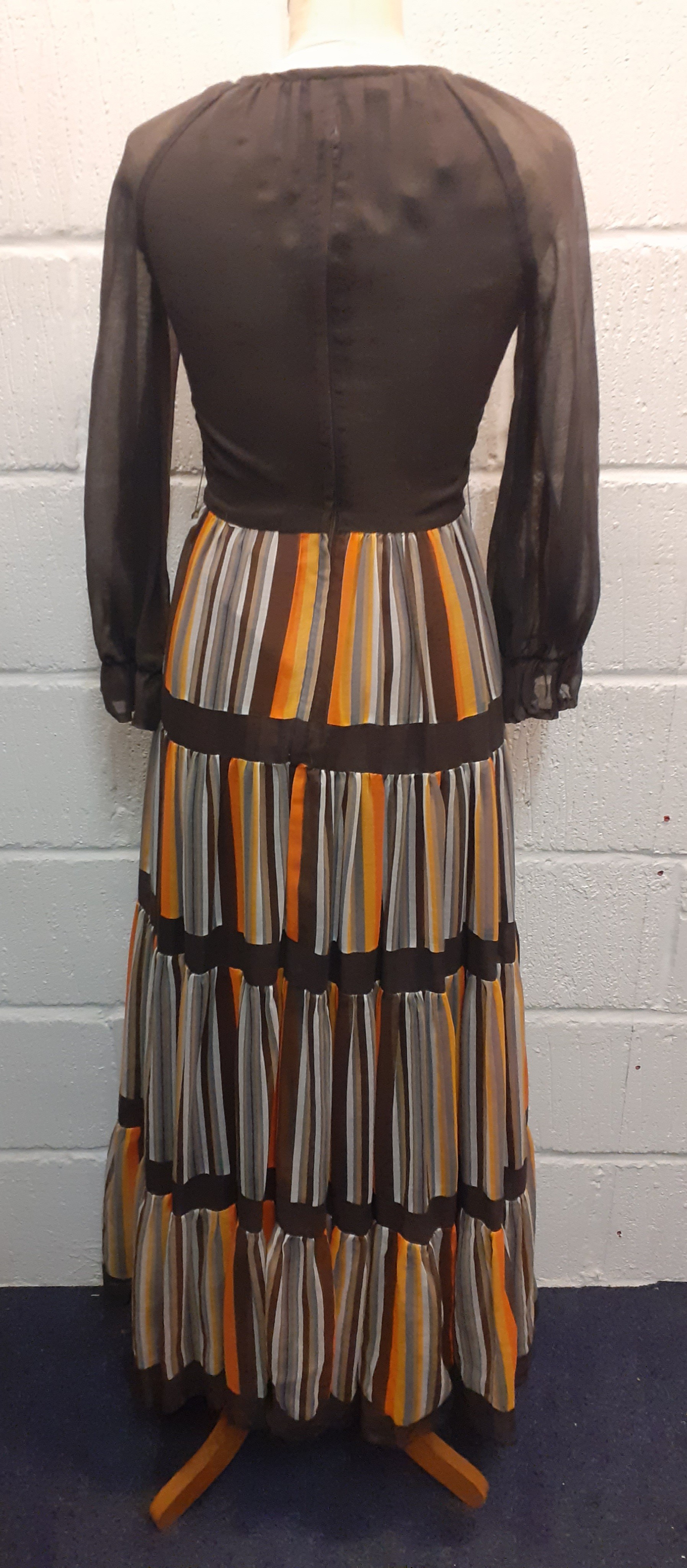 A 1970's Pat Farrell sheer brown full length dress having orange, yellow, brown and white stripes to - Image 8 of 12