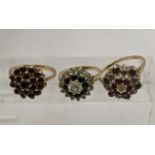 Three 9ct gold cluster rings one set with red garnets, one set with diamonds and rubies and one