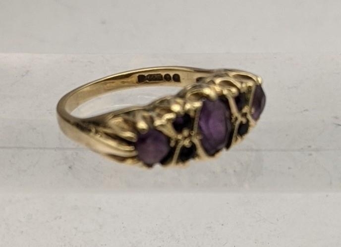 Three 9ct gold rings to include a diamond and ruby bomb ring, a ring set with amethysts and one - Image 2 of 4