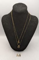 Mixed 9ct gold and yellow metal to include two 9ct gold necklaces, a yellow metal infinity pendant