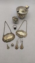 Mixed silver to include a silver embossed mustard pot, a silver ring, a silver Cambodian figural