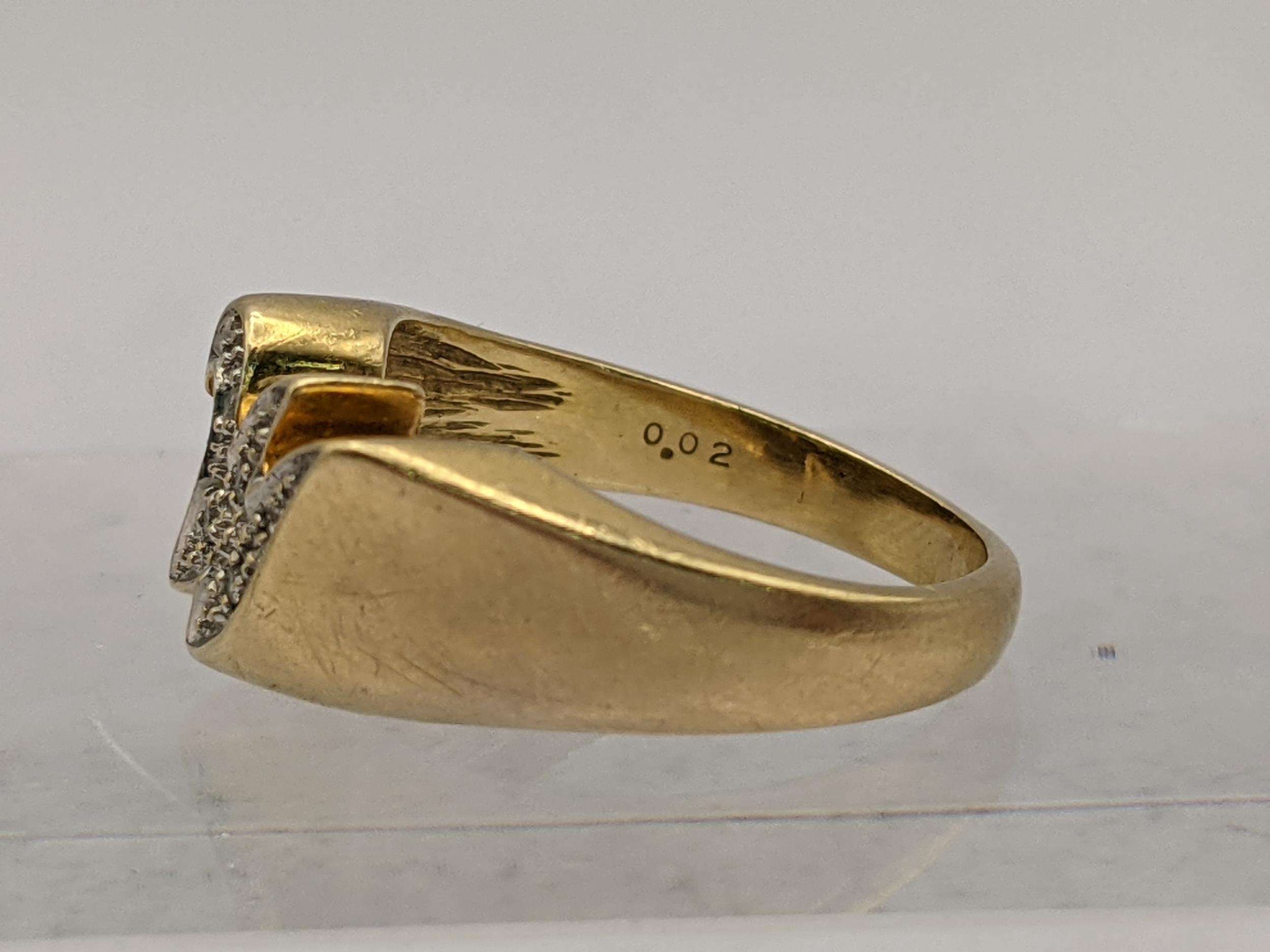 An 18ct gold ring in the form of the letter M set with diamonds, total weight 4.6g Location: - Image 4 of 4