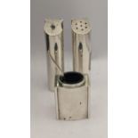 A Silver salt and pepper pot hallmarked London 1994 together with a matching mustard pot, total