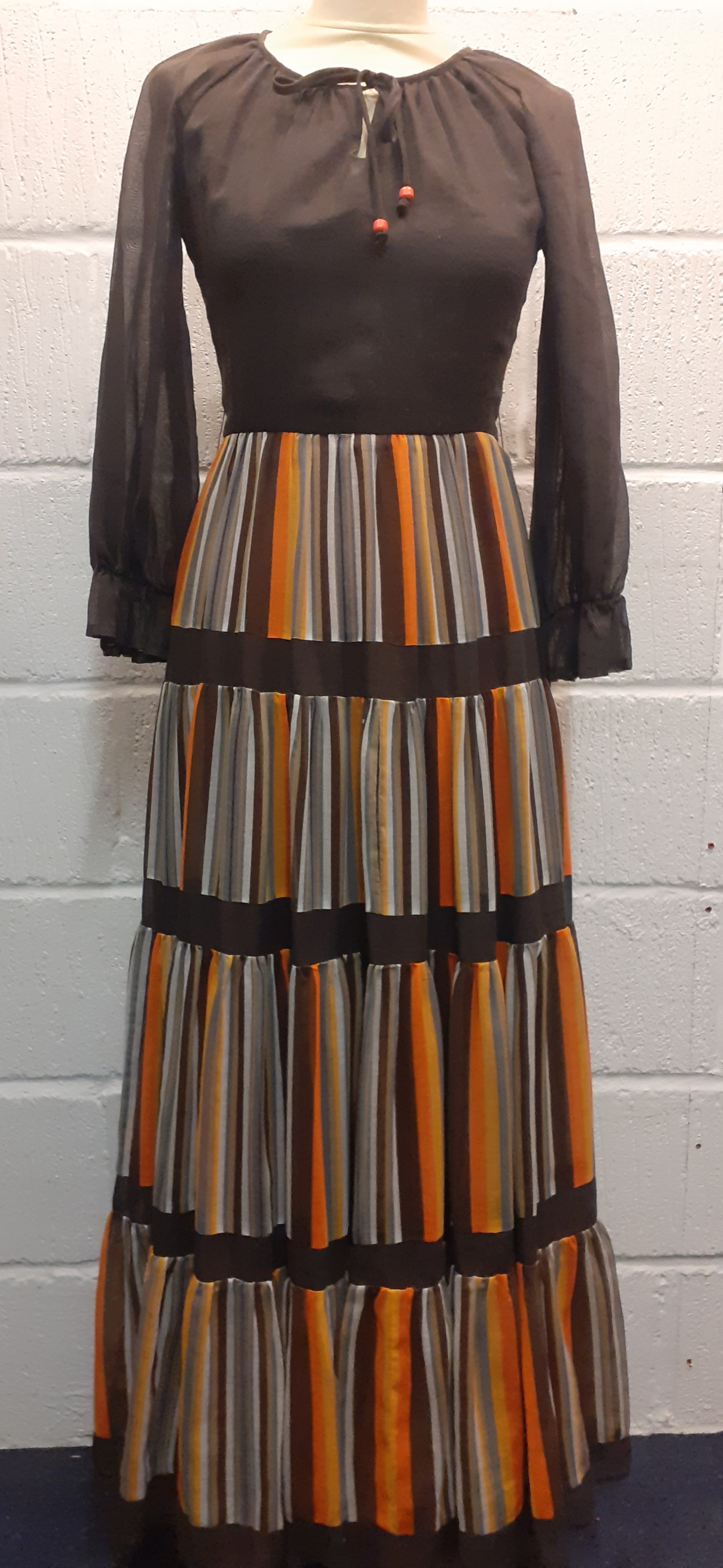 A 1970's Pat Farrell sheer brown full length dress having orange, yellow, brown and white stripes to - Image 2 of 12