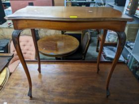 A Victorian mahogany occasional table on cabriole legs 70cm x 73cm x 42cm A/F Location: