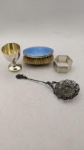 Mixed silver items to include a Birmingham 1928 egg cup, a napkin ring, a pierced spoon and a