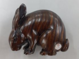 A Japanese treen netsuke in the form of a hare, Location: CAB