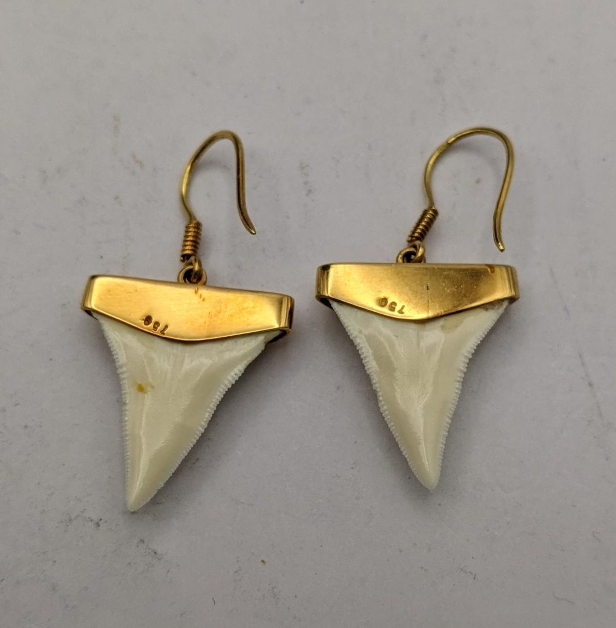 A pair of 18ct gold earrings stamped 750 set with fish teeth Location: - Image 2 of 2
