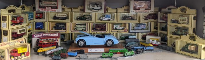 A collection of approximately thirty six Days Gone boxed model cars, along with an MGA twin cam