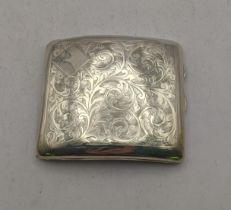A Birmingham 1925 silver cigarette case having a floral engraved design total weight 81.7g Location: