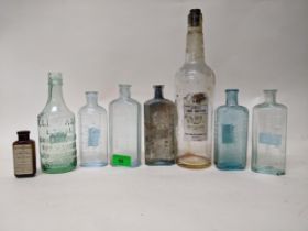 Eight Slough chemist and poison bottles including two with original labels plus a Slough foot warmer