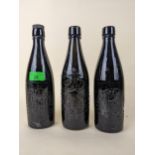 Three scarce Herbert's Supply Stores, Eton beer bottles embossed with a coat of arms (two variants)