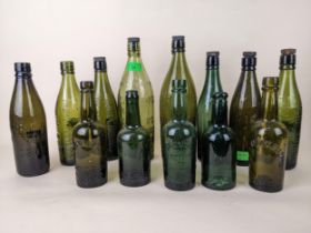 Thirteen Windsor beer bottles; ten variants from the John Canning brewery and three from Noakes