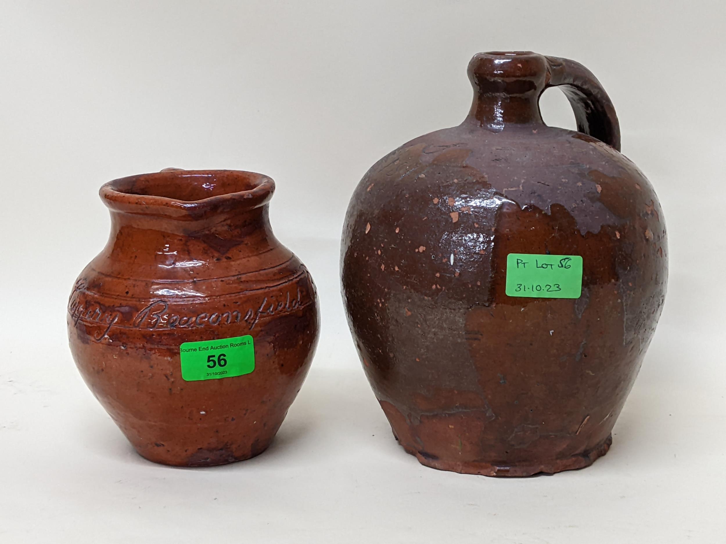A pottery jug inscribed John Tiggery, Beaconsfield, Bucks, 1885 and another similar initialled G.S.