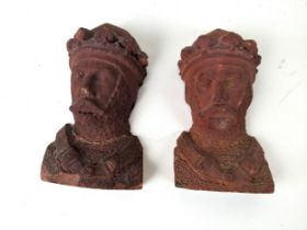 A pair of terracotta corbels in the form of Medieval knights, both stamped Maidenhead Brick & Tile
