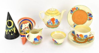 A Clarice Cliff 'Crocus' pattern tea set, comprising a teapot, sugar pot, milk jug, teacup, saucer