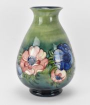 A large Walter Moorcroft pottery vase in the 'anemone' pattern, shape 7/5, the pink/blue/purple