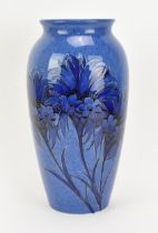 A William Moorcroft (1872-1945) powder blue 'cornflower' vase, circa 1920s, of ovoid form with
