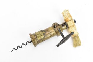 A 19th century brass barrel corkscrew with turned bone handle, coat of arms to barrel
