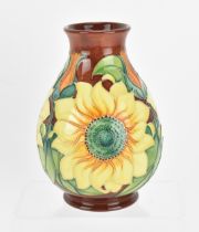 A Moorcroft pottery 'Inca Sunflower' pattern vase designed by Rachel Bishop, 1994, of baluster